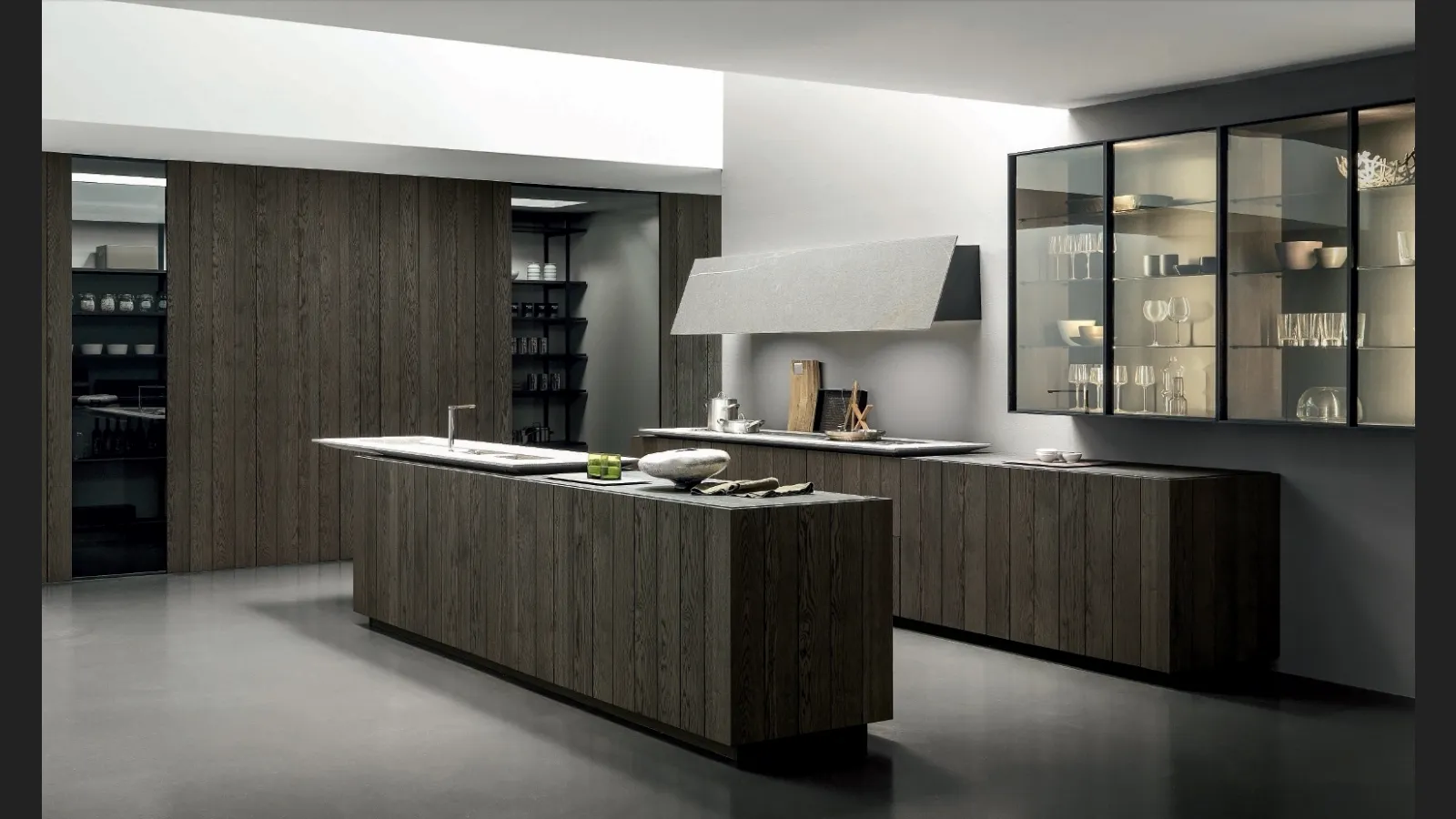 Cucina Design con isola Float finitura Rovere Carbone con top in Pietra Piasentina Fiammata di Modulnova
